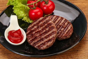 Grilled burger cutlet with sauce
