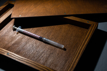 Fototapeta premium Corona virus vaccine, Covid-19 vaccine in the box. White background and syringes.