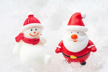 Santa claus and snowman on snow Christmas and happy new year day