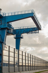 Construction cranes for coal transportation fenced