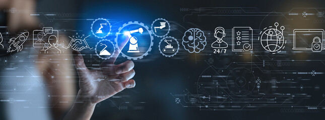 Woman Engineer hand using digital computer and checking icon robotics automatic arms machine. Augmented reality in intelligent factory  industrial with monitoring system software.