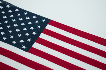 Fototapeta premium American flag with an american flag pen on a white table 