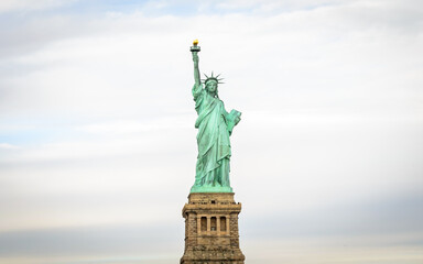 Fototapeta na wymiar Low Angle View of Statue of Liberty Enlightening the World. Manhattan, New York City, USA