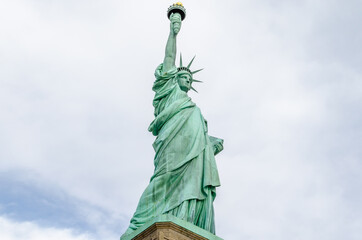 Fototapeta premium Low Angle View of Lady Liberty Statue Enlightening the World in New York City, USA