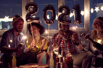 Excited couples at New Year eve home party. New Year, home party, friends time together