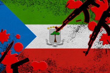 Equatorial Guinea flag and guns in red blood. Concept for terror attack and military operations