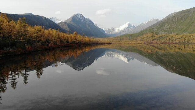 Russia, Kolyma. Lake Jack London. Autumn landscape. Forest tundra.