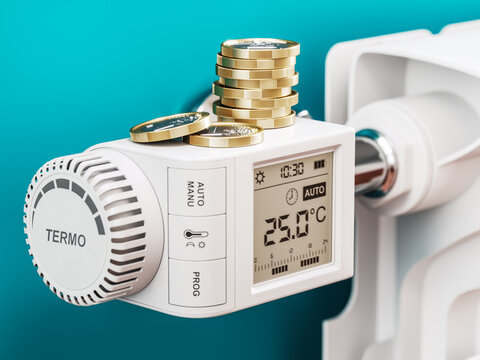 Heating savings concept. Coins on radiator temperature regulator