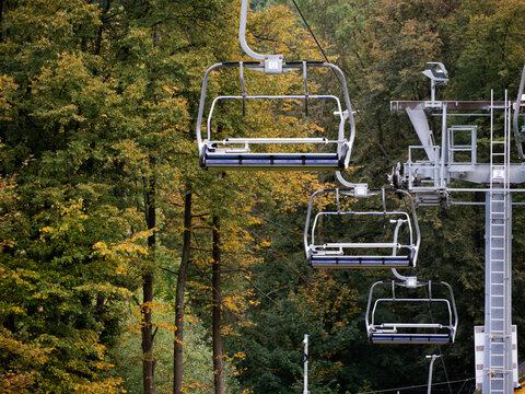 Closeup of chairlifts in a mountain resort in autumn