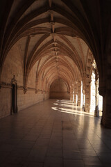 Archway of an old monastery. Cloisters of Jeronimos Monastery. Lisbon Portugal
