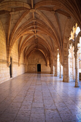 Obraz premium Archway of an old monastery. Cloisters of Jeronimos Monastery. Lisbon Portugal
