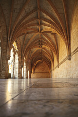 Obraz premium Archway of an old monastery. Cloisters of Jeronimos Monastery. Lisbon Portugal