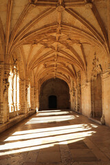 Archway of an old monastery. Cloisters of Jeronimos Monastery. Lisbon Portugal