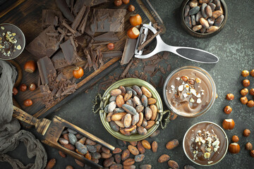 Cocoa beans on old background