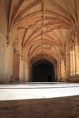Fototapeta premium Archway of an old monastery. Cloisters of Jeronimos Monastery. Lisbon Portugal