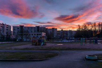 Fototapeta premium Colorful sunrise on a snowless winter morning.