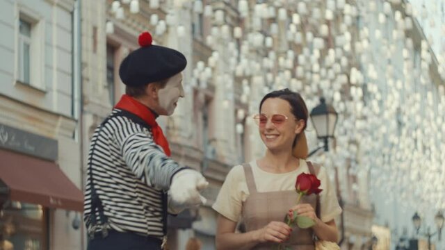Mime seeing off an attractive girl with a red rose