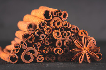 Cinnamon sticks on black background