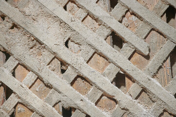 texture of the destroyed wall of a living room. Shingles nailed to the wall cross to cross for fixing the plaster. Photography - the concept of devastation and antiquity