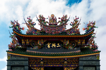 Penghu island (Pescadores) Taiwan October 14, 2019 Colorful Taiwanese temple decorated with sculptures of sacred animals, dragons, lions and deities in traditional mosaic art