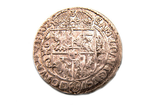 medieval European silver coin on white background