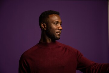 Fototapeta premium Profile Portrait of Black Man with Head Turned
