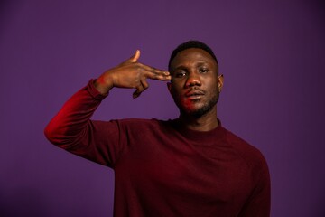 African Man Showing Suicide Hand Sign
