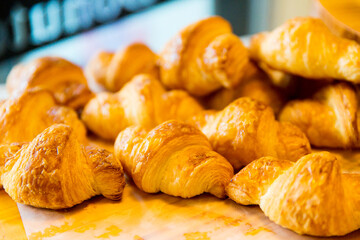 Freshly baked sweet pastries or bread rolls at the street market