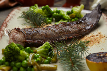 fish with vegetables and sauce