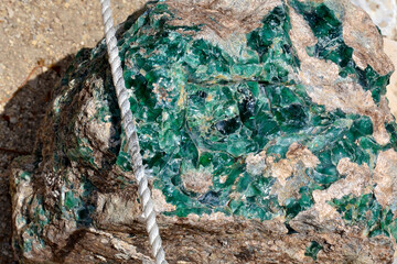 Ancient green glass that was once brewed in the city of Tyros, Lebanon.