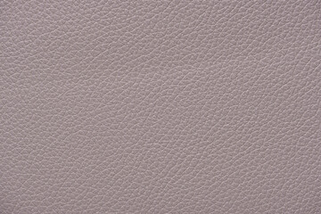 Extremely close-up light grey leather texture background surface