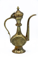 Fototapeta na wymiar old brass kettle, it's slim and tall