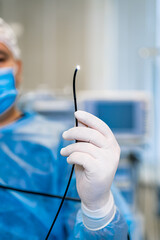 Gastroduodenoscopy of the distal end and manipulator in the hands of doctors in the surgery room....