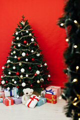 Christmas interior Christmas tree holiday red decor presents new year