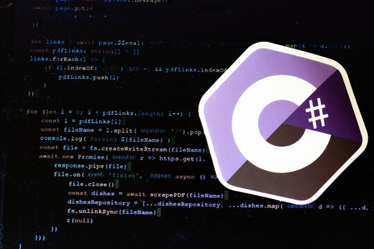 Moscow, Russia - 1 June 2020: C sharp logo sign with program code on background Illustrative Editorial