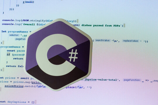 Moscow, Russia - 1 June 2020: C sharp logo sign with program code on background Illustrative Editorial