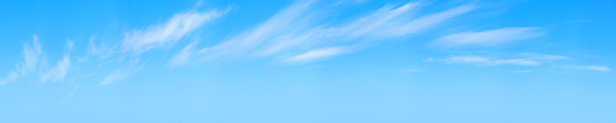 Naklejka na ściany i meble Blue sky with white cirrus clouds at daytime
