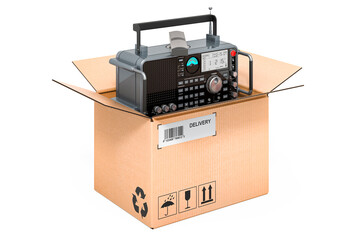 Modern digital receiver inside cardboard box, delivery concept. 3D rendering
