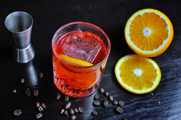 The cocktail is beautiful, delicious with lime, mint and ice in a glass