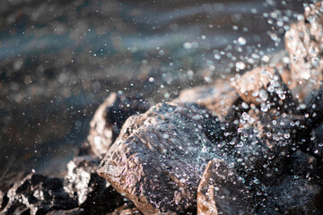 Water drops from the fountain. Abstraction from water. Water droplets background.