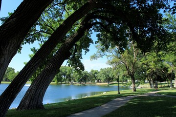 sidewalk in the park at the  lake in Sterling Kansas USA. On a summer day.