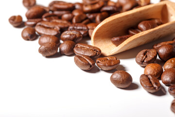 Heap of fresh roasted coffee beans isolated on white background as package design elements