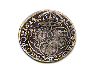 medieval European silver coin on white background