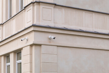 Fototapeta na wymiar Two CCTV cameras on the corner of the house