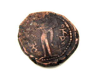 Antique copper coin of Byzantium on a white background