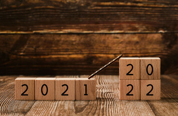 2021 and 2022 on wooden cubes - new year concept