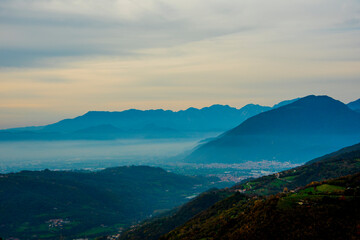 mist between plains and hills