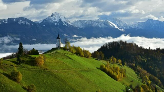 Slovenia landscape timelapse 4k footage at sunrise , Slovenian hill church 