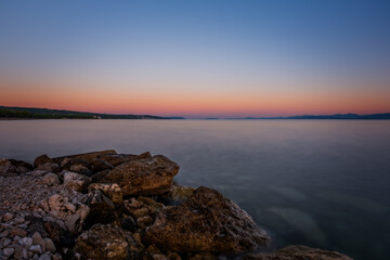 Croatia, Brac island, beach Supetrus at sunrise near Supetar. August 2020. Long exposure picture.