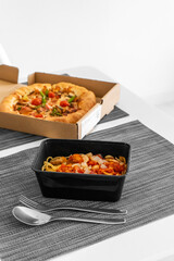 Set lunch, pizza with pasta. Food delivery